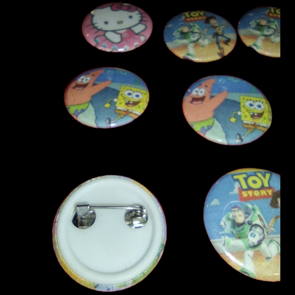 Thirty-two Cartoon Themed One Inch Buttons - Picture 10 of 10